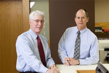 Photo of firm founders John M McHenry and James L Haszard